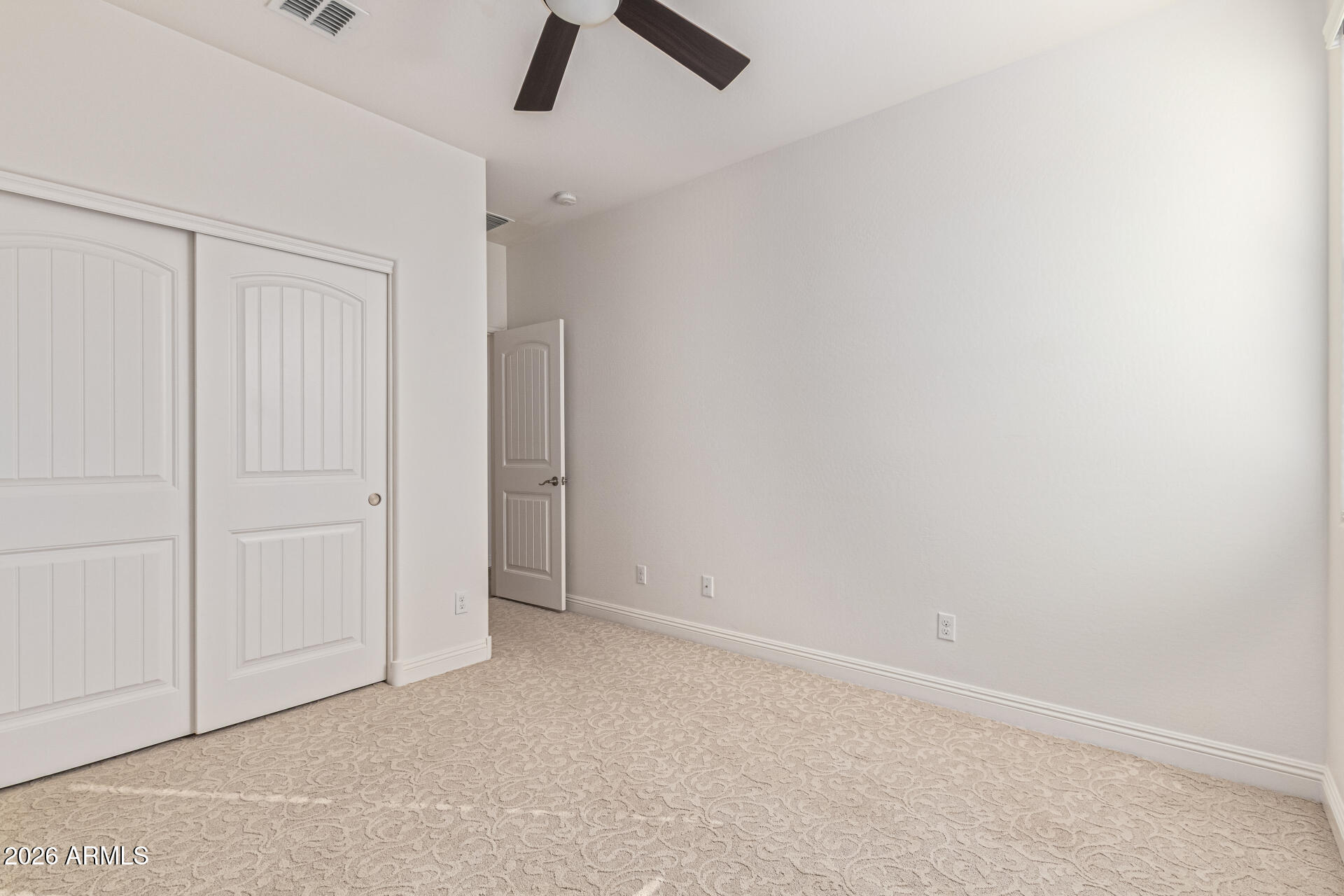32187 North Royce Road San Tan Valley, AZ 85144 - Photo 24 of 38 an empty room with view of ceiling fan