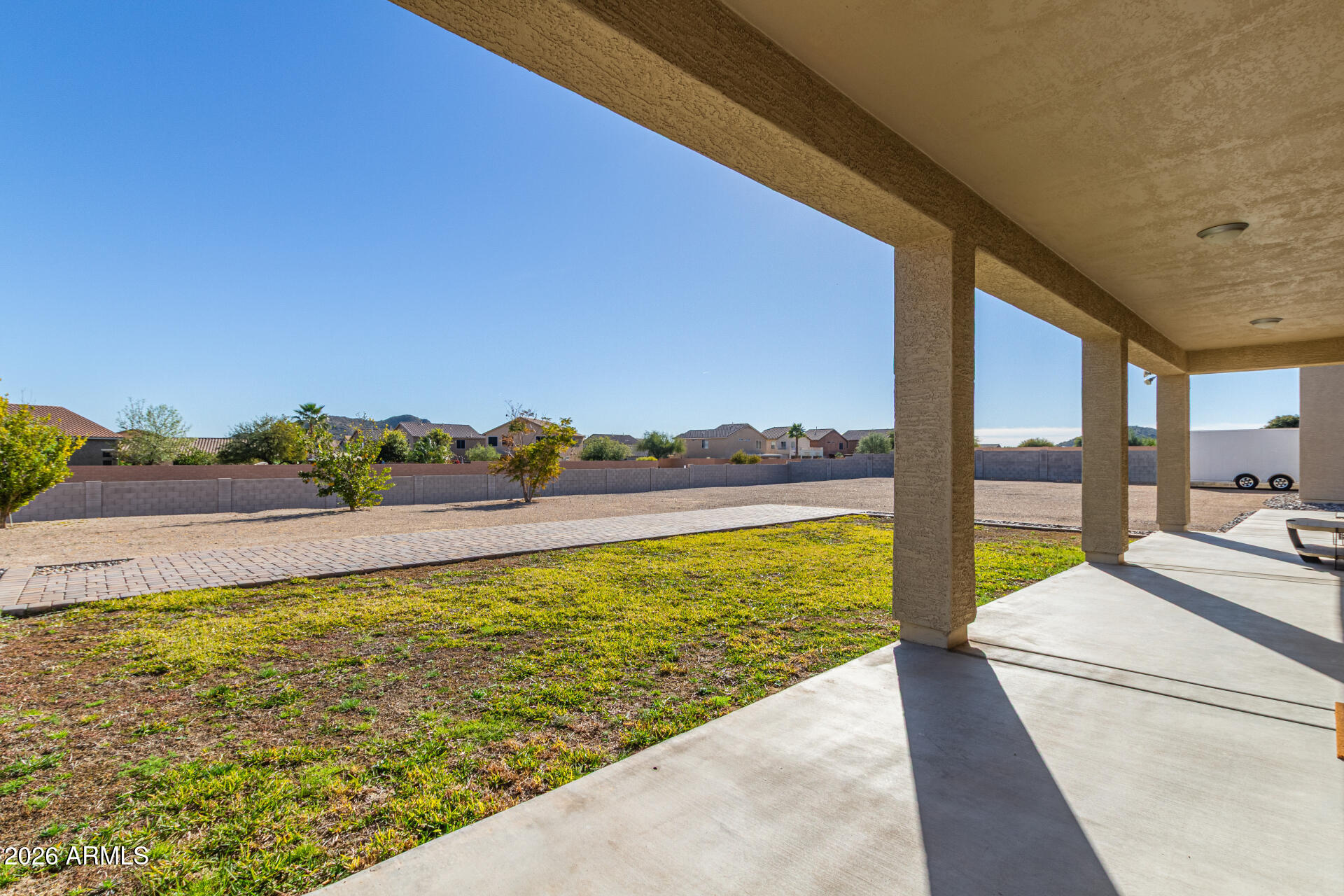 32187 North Royce Road San Tan Valley, AZ 85144 - Photo 30 of 38 a view of a swimming pool and an ocean from a balcony