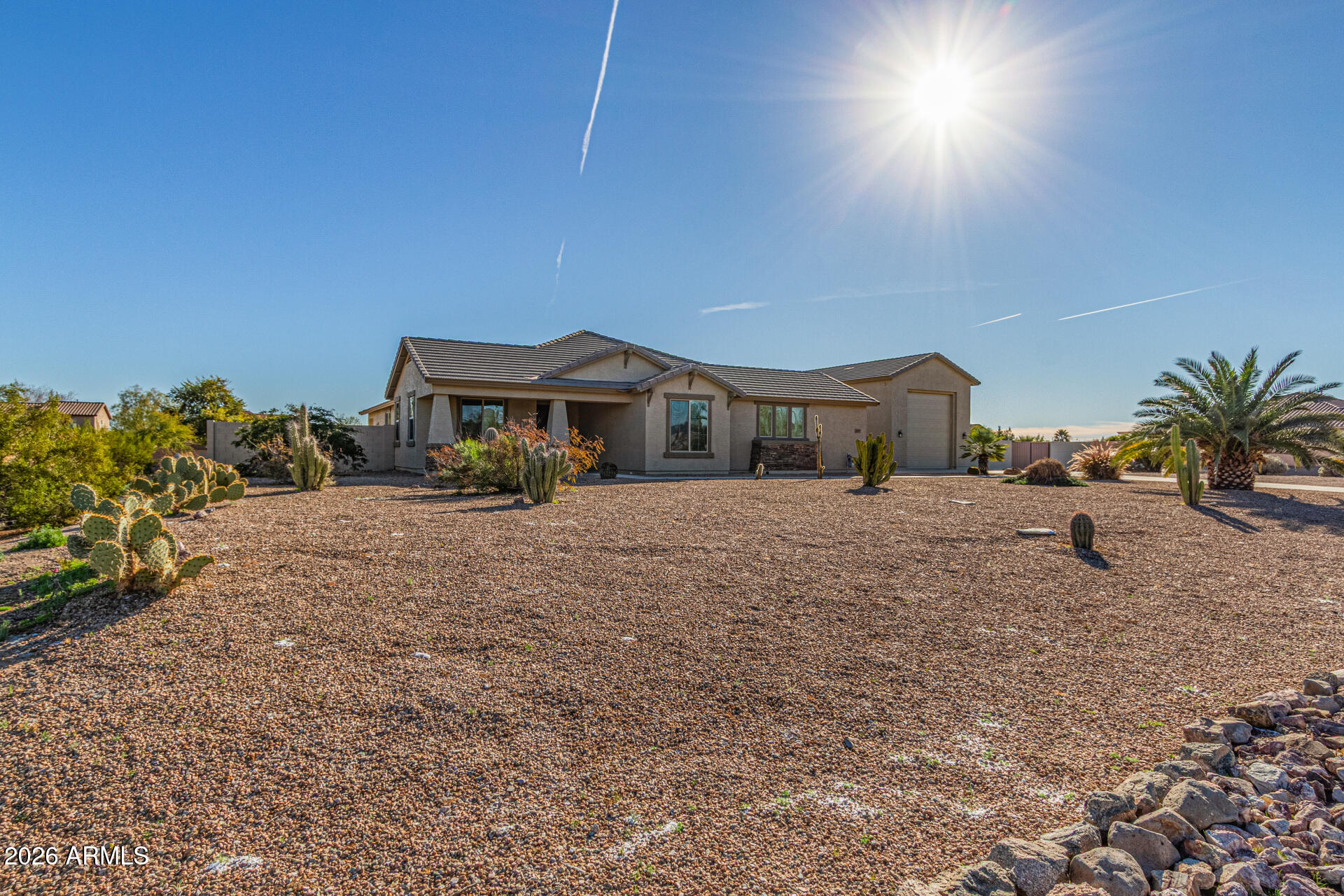 32187 North Royce Road San Tan Valley, AZ 85144 - Photo 3 of 38 a house view with a outdoor space