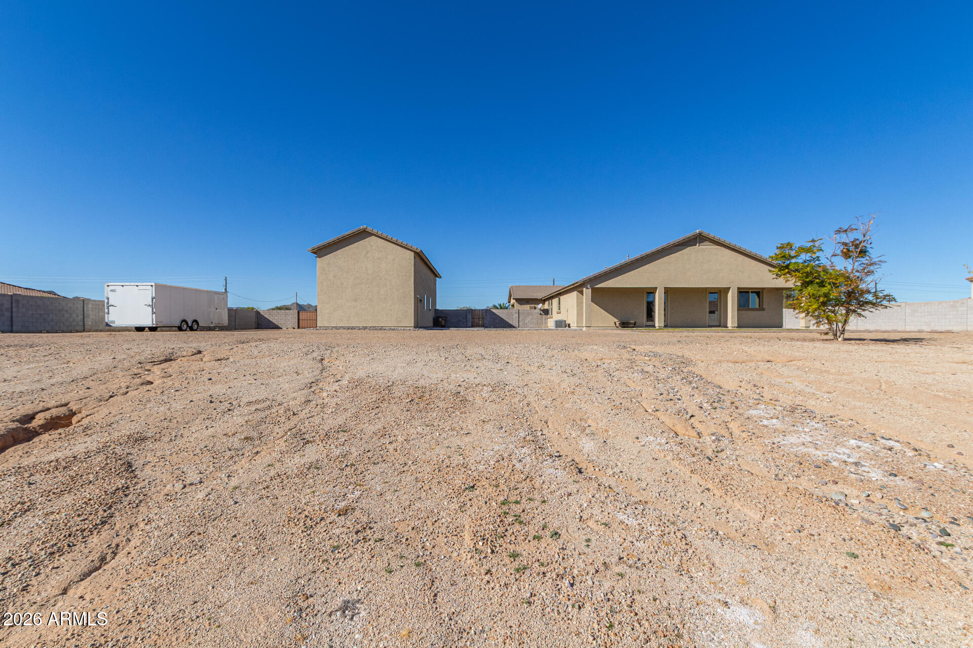 32187 North Royce Road San Tan Valley, AZ 85144 - Photo 35 of 38 a big room with a bed and a view of house
