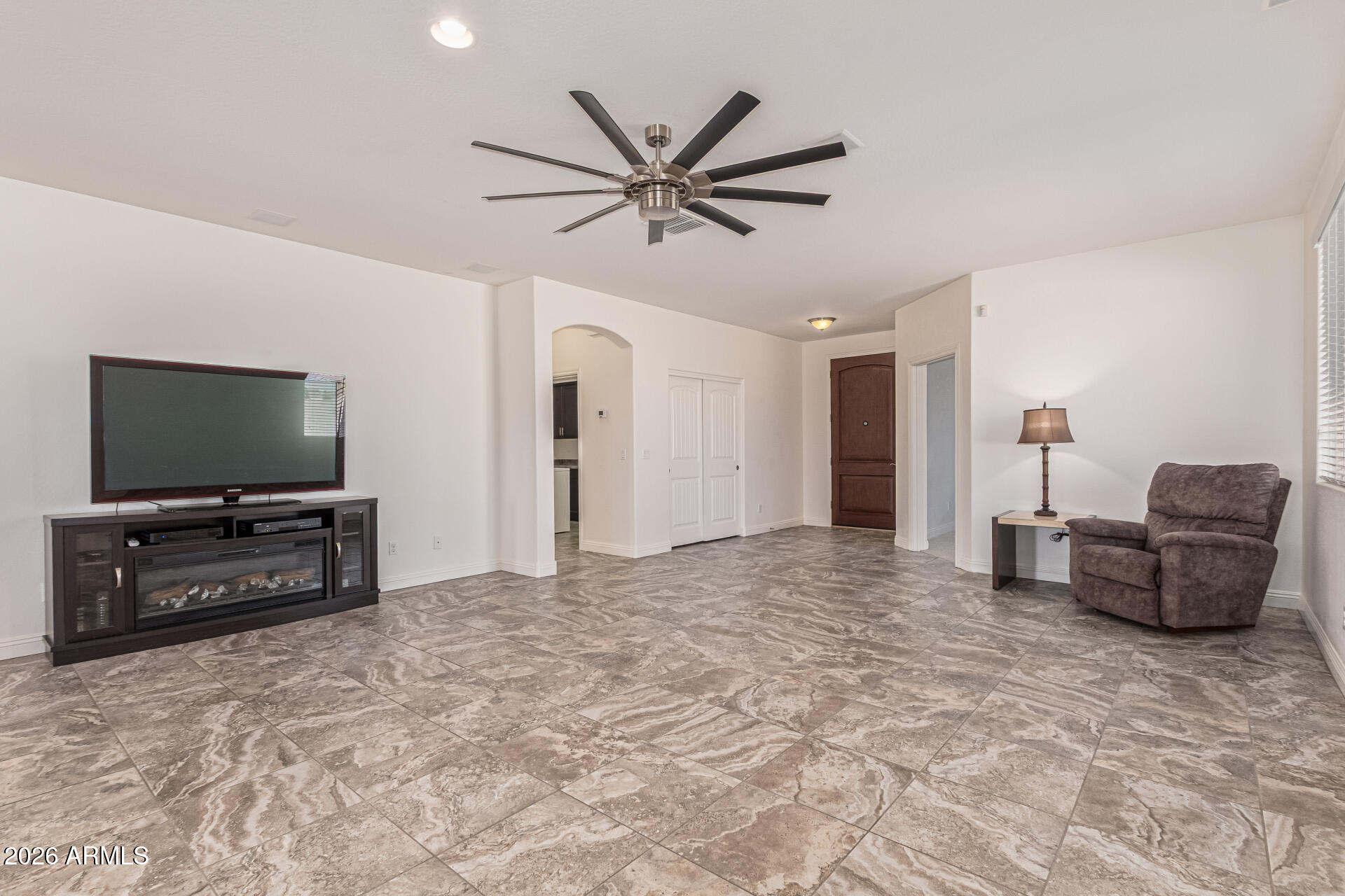 32187 North Royce Road San Tan Valley, AZ 85144 - Photo 6 of 38 a living room with furniture and a flat screen tv
