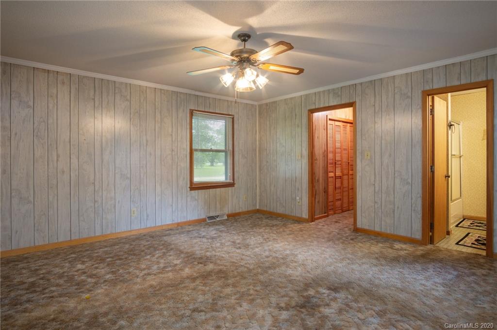 726 Kelly Road York, SC 29745 - Photo 16 of 31 an empty room with windows and fan