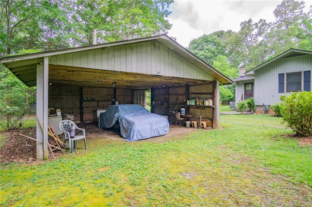726 Kelly Road York, SC 29745 - Photo 21 of 31 a view of a chair and table in backyard of the house