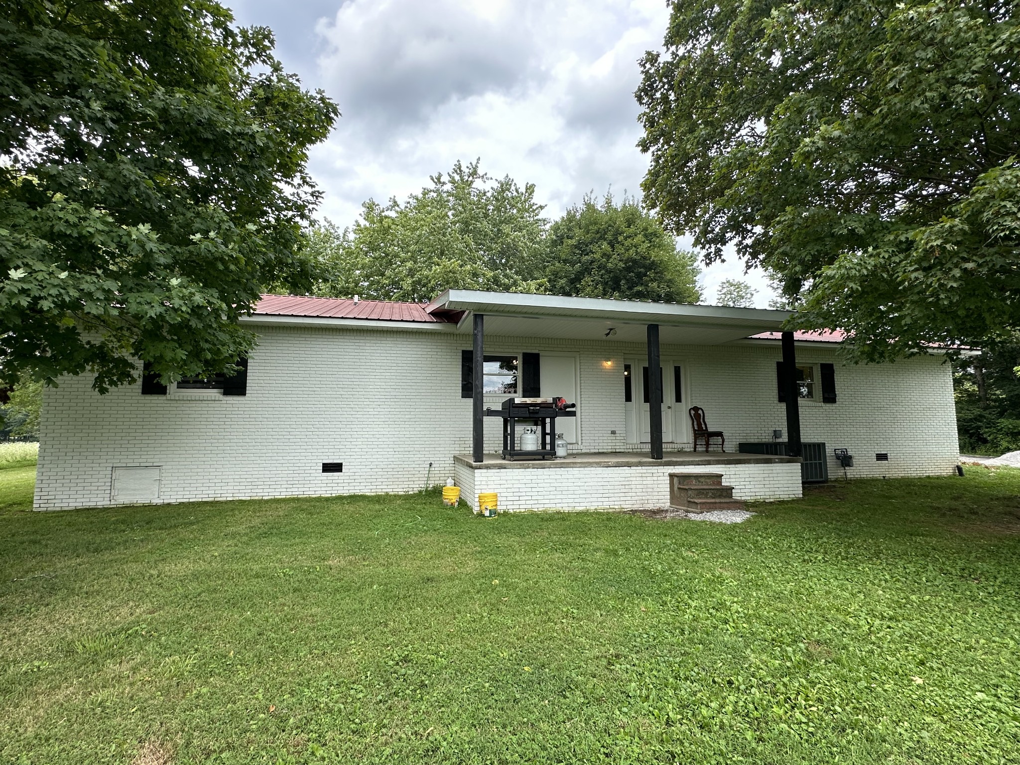 403 Fredonia Road Crossville, TN 38571 - Photo 42 of 50 a view of a house with a yard and sitting area