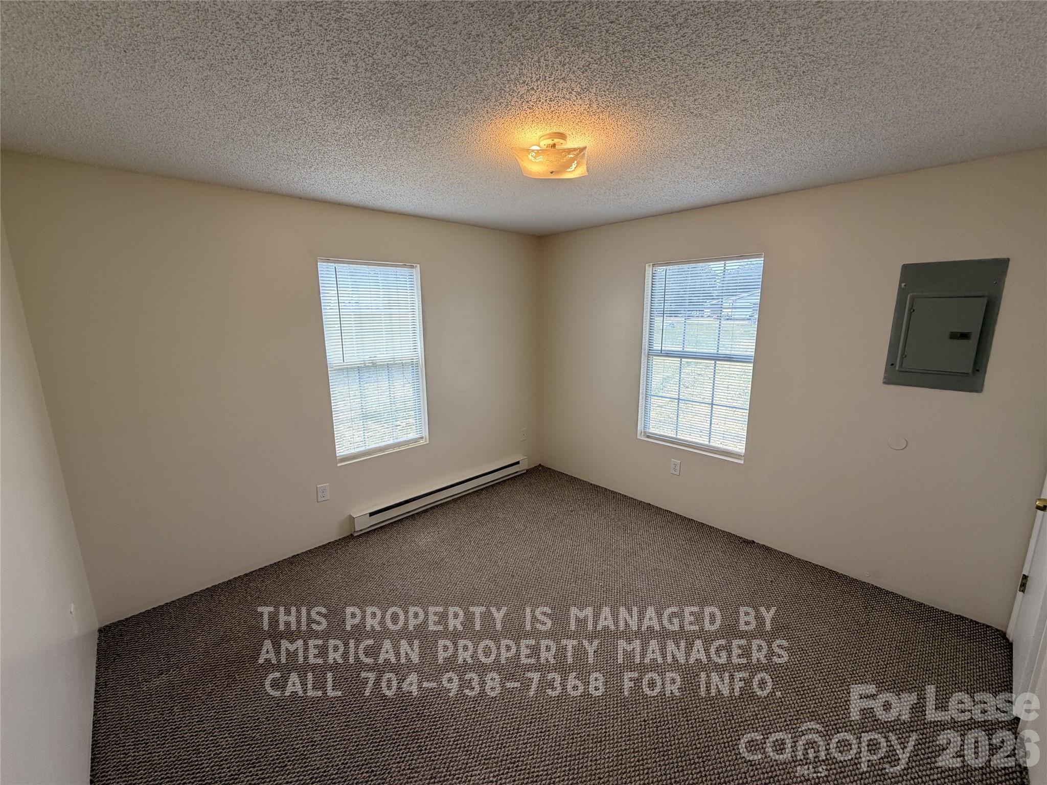 1860 Sells Road Salisbury, NC 28144 - Photo 4 of 9 an empty room with windows