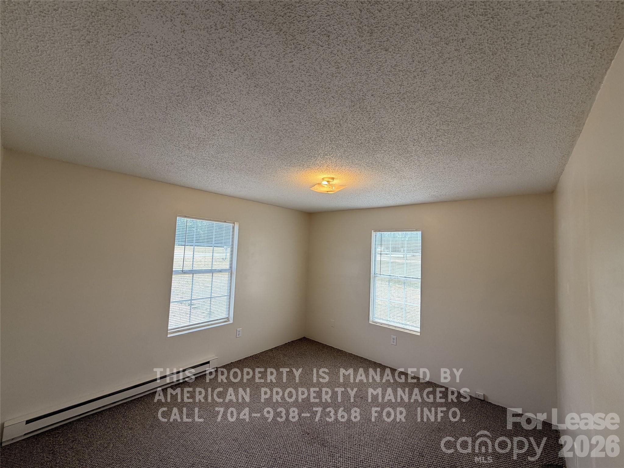 1860 Sells Road Salisbury, NC 28144 - Photo 6 of 9 an empty room with windows