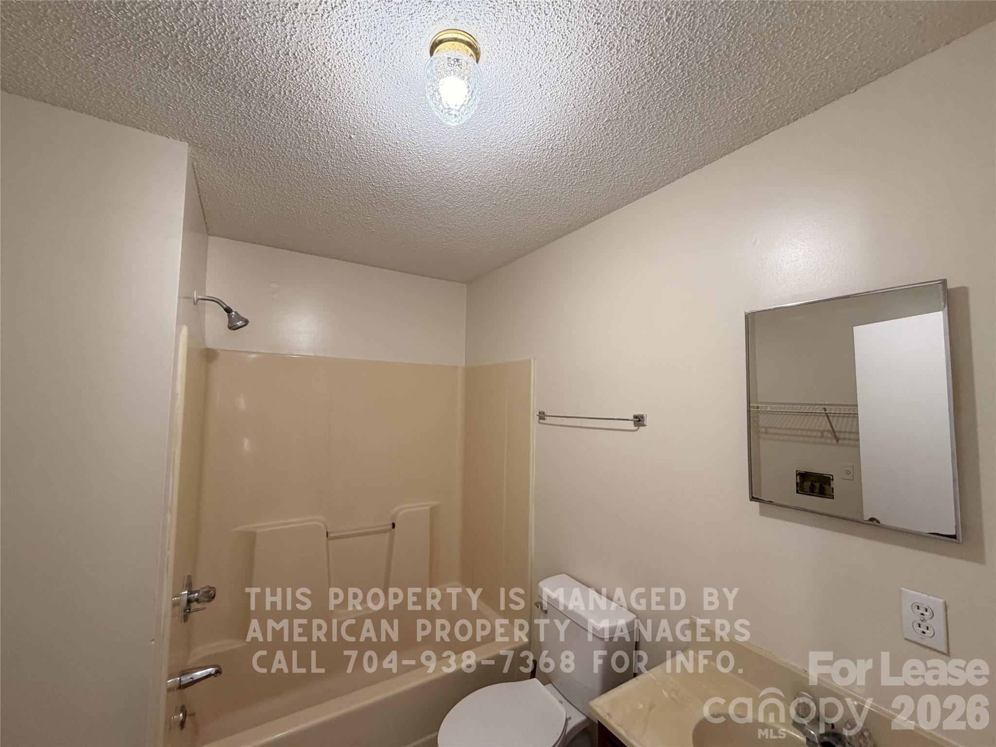 1860 Sells Road Salisbury, NC 28144 - Photo 7 of 9 a bathroom with a sink and a mirror