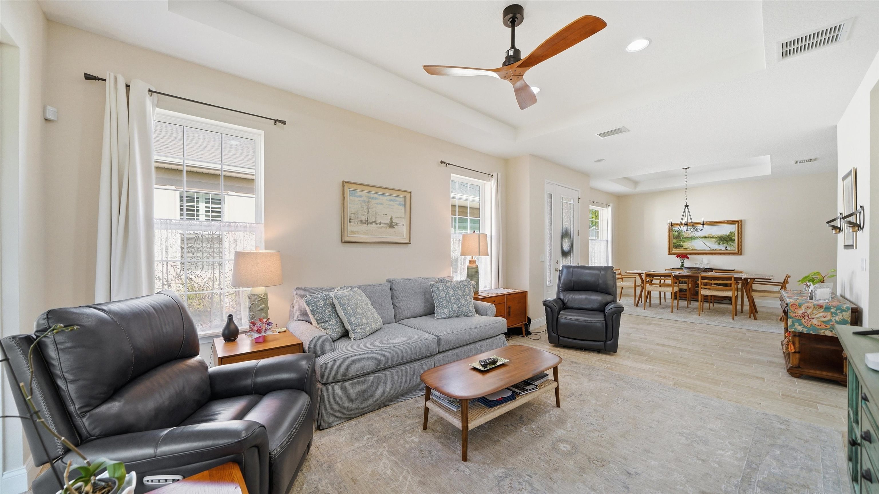 74 Wrendale Loop Ormond Beach, FL 32174 - Photo 23 of 59 a living room with furniture a couch and a window