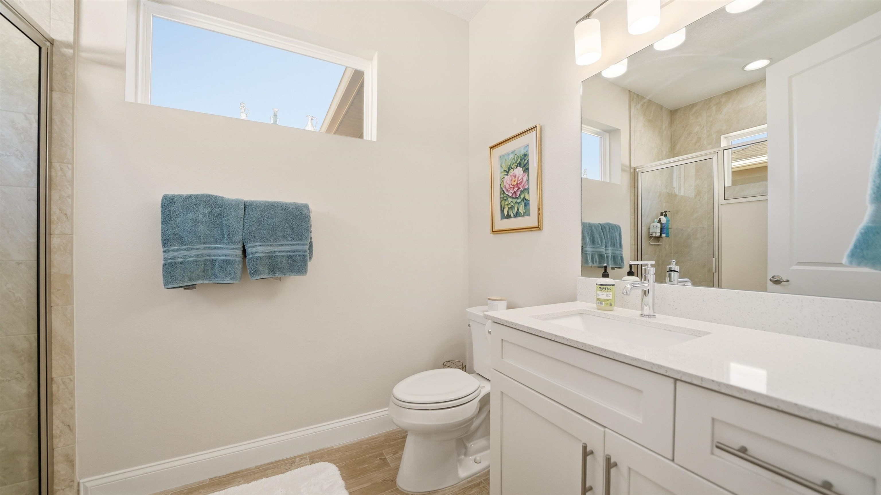 74 Wrendale Loop Ormond Beach, FL 32174 - Photo 26 of 59 Full bath featuring vanity, light wood-type flooring, and tiled shower