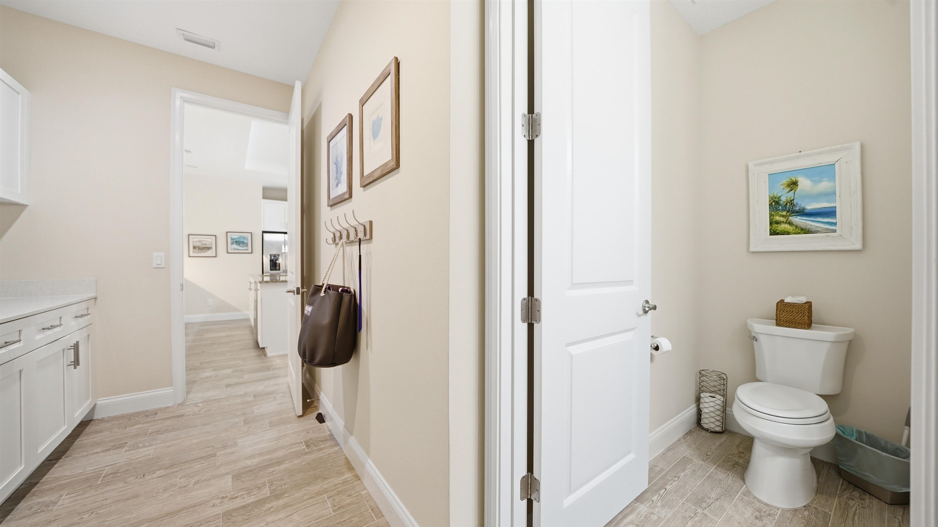 74 Wrendale Loop Ormond Beach, FL 32174 - Photo 33 of 59 Bathroom featuring wood finish floors and vanity