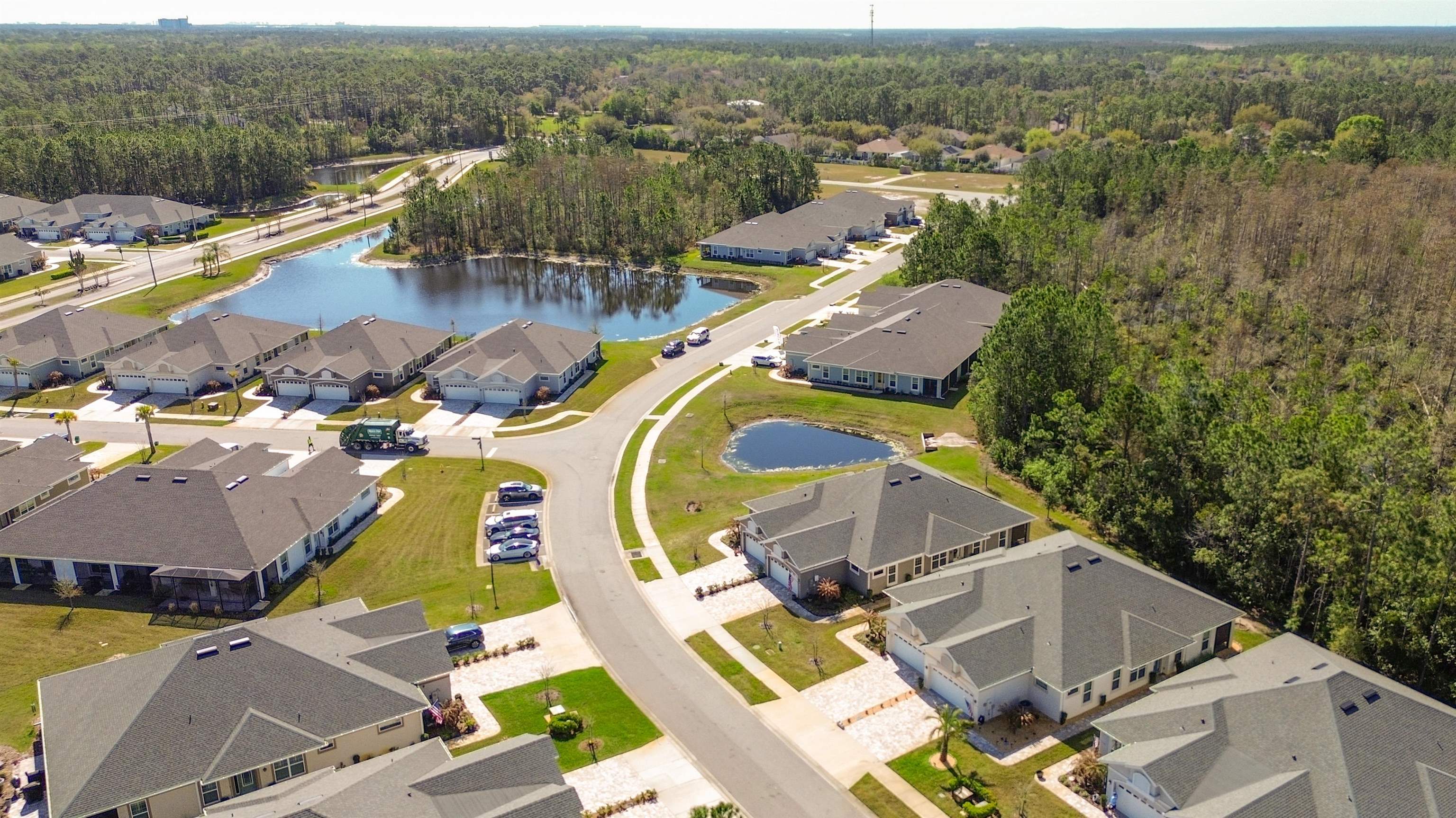 74 Wrendale Loop Ormond Beach, FL 32174 - Photo 42 of 59 Aerial perspective of suburban area with a nearby body of water