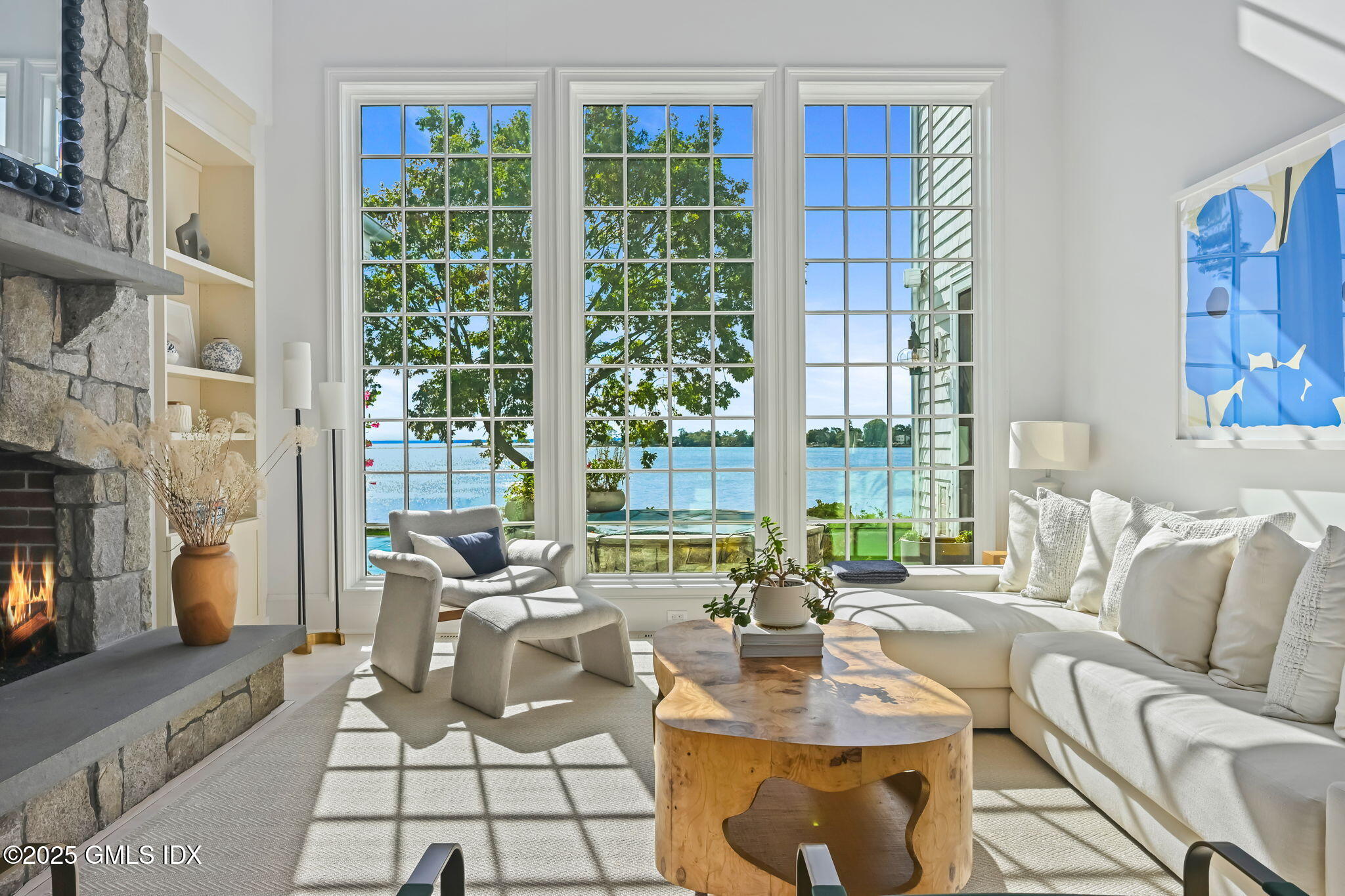 19 Weeds Landing Darien, CT 06820 - Photo 16 of 98 a living room with furniture and a large window