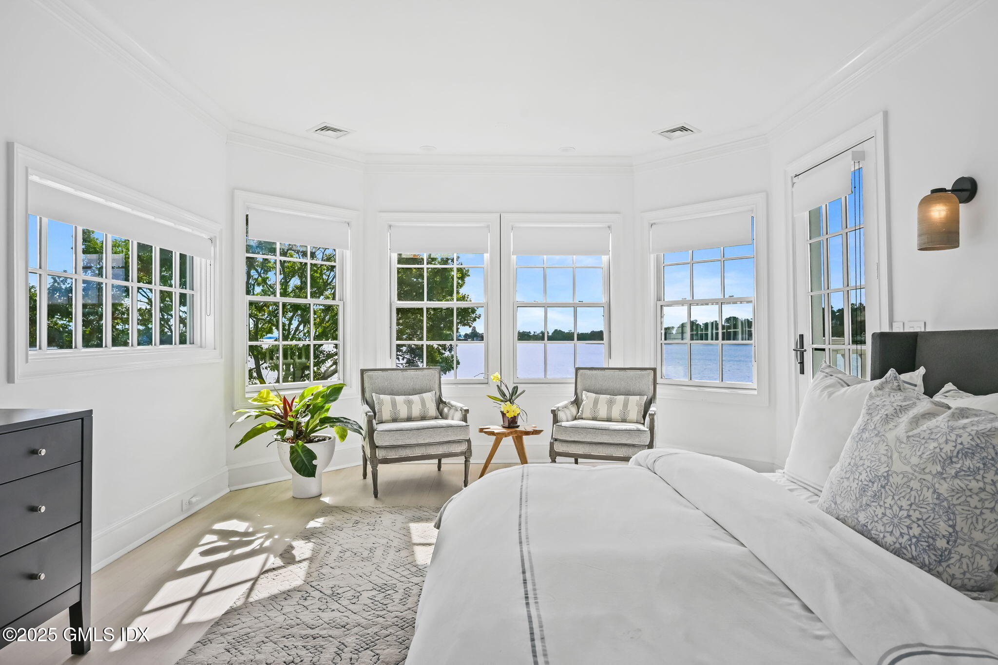 19 Weeds Landing Darien, CT 06820 - Photo 28 of 98 a bedroom with furniture and large windows