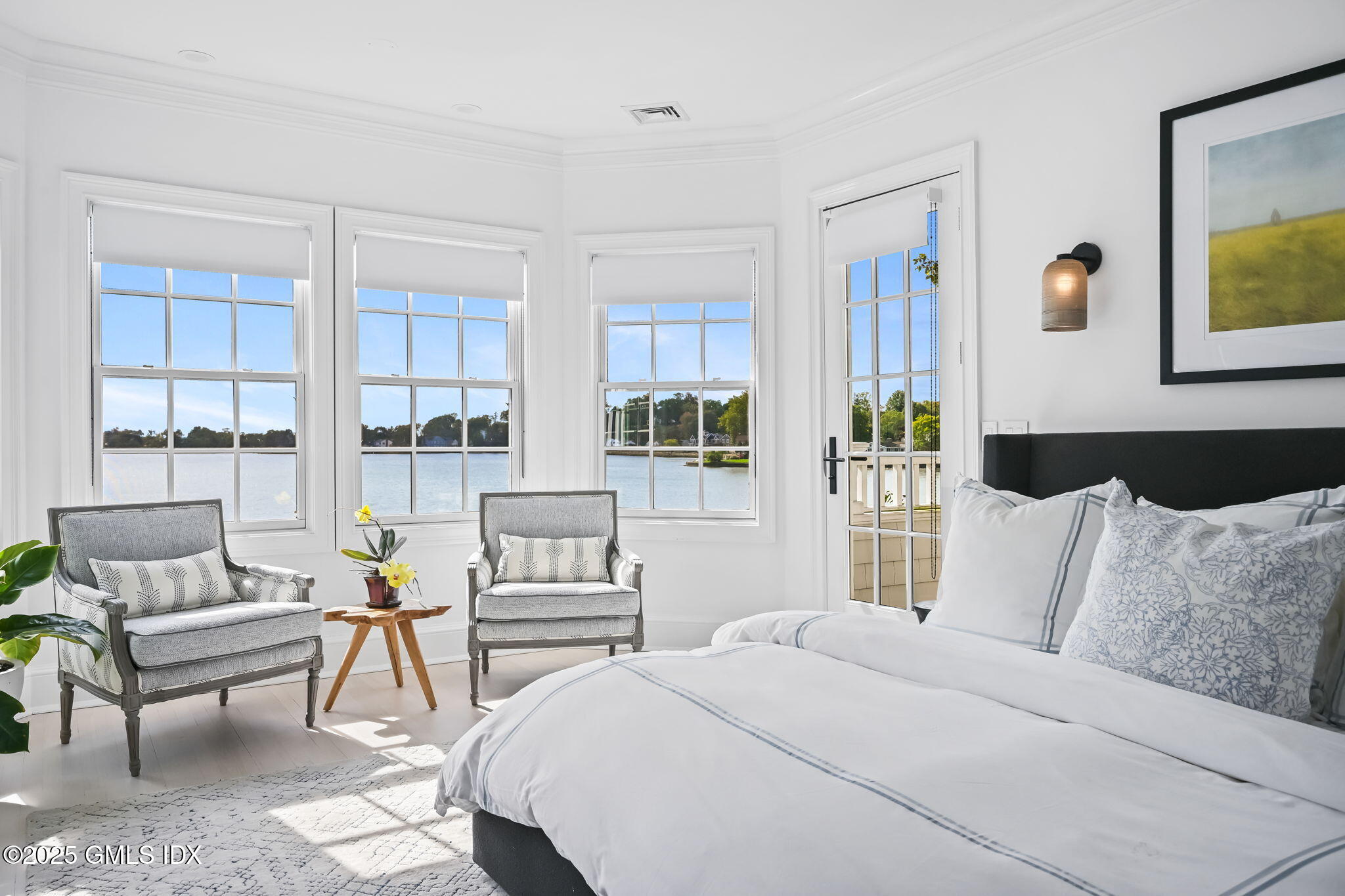 19 Weeds Landing Darien, CT 06820 - Photo 30 of 98 a bedroom with a large bed and a couch