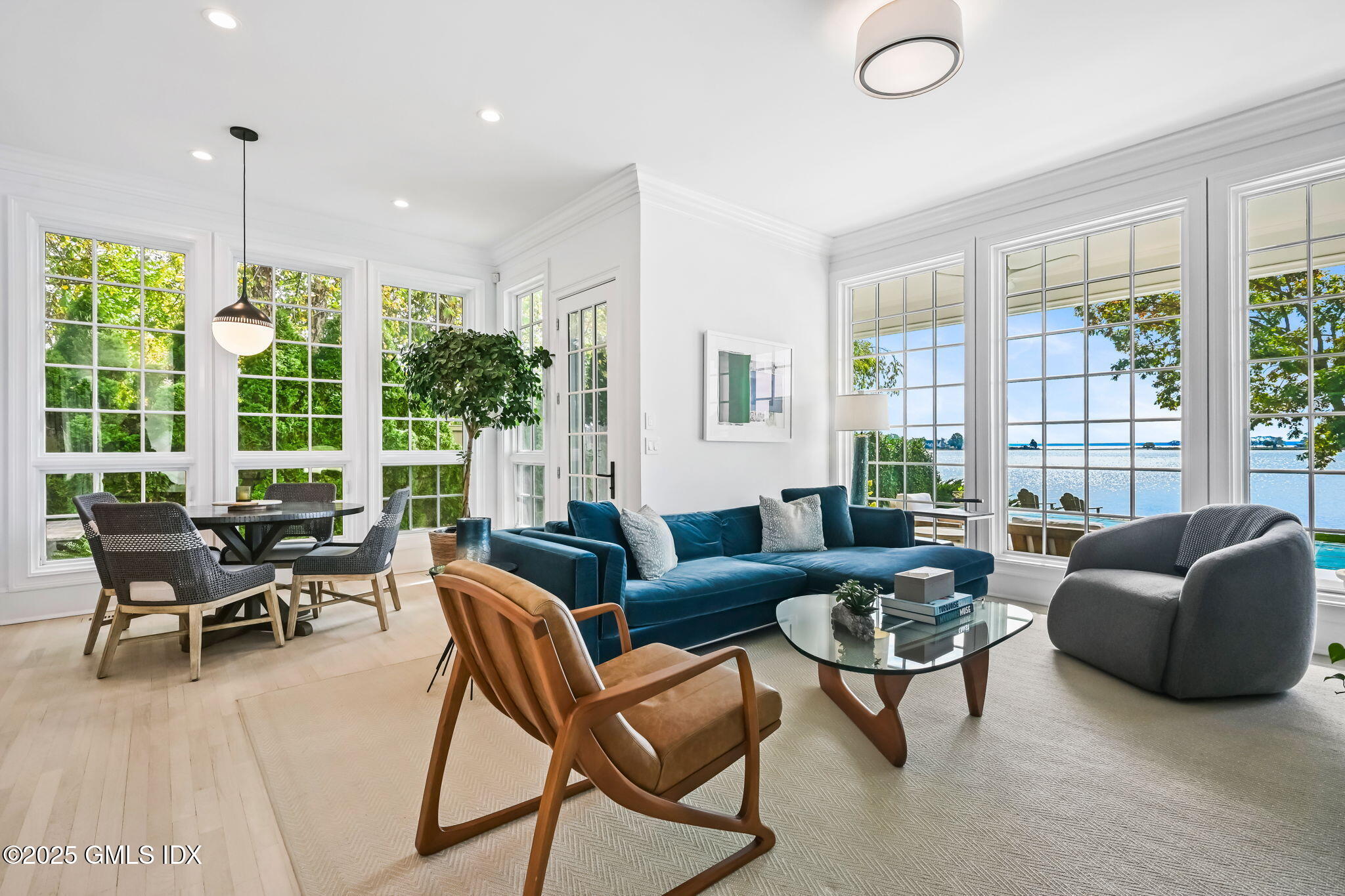 19 Weeds Landing Darien, CT 06820 - Photo 37 of 98 a living room with furniture and a large window