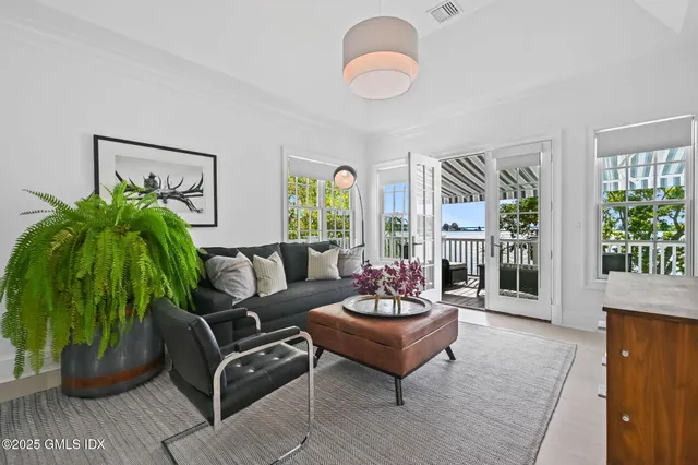 a kitchen with a sink cabinets and appliances