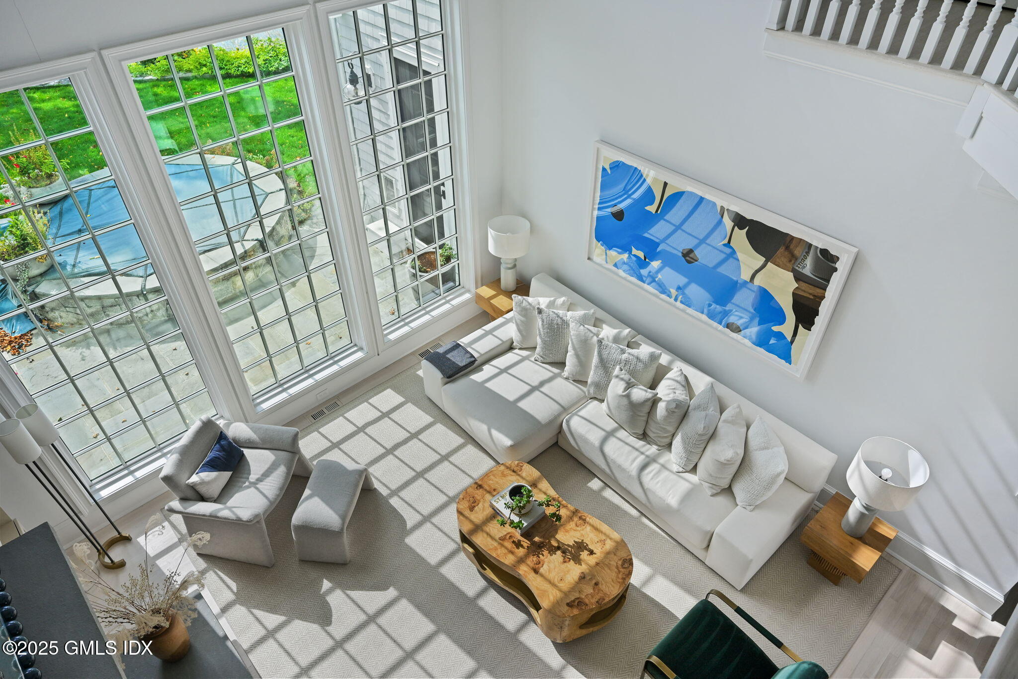 19 Weeds Landing Darien, CT 06820 - Photo 60 of 98 a living room with furniture and a large window