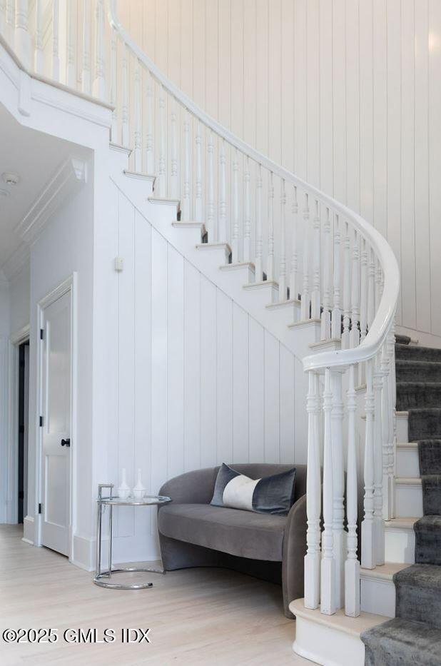 19 Weeds Landing Darien, CT 06820 - Photo 83 of 98 a living room with furniture and a chandelier