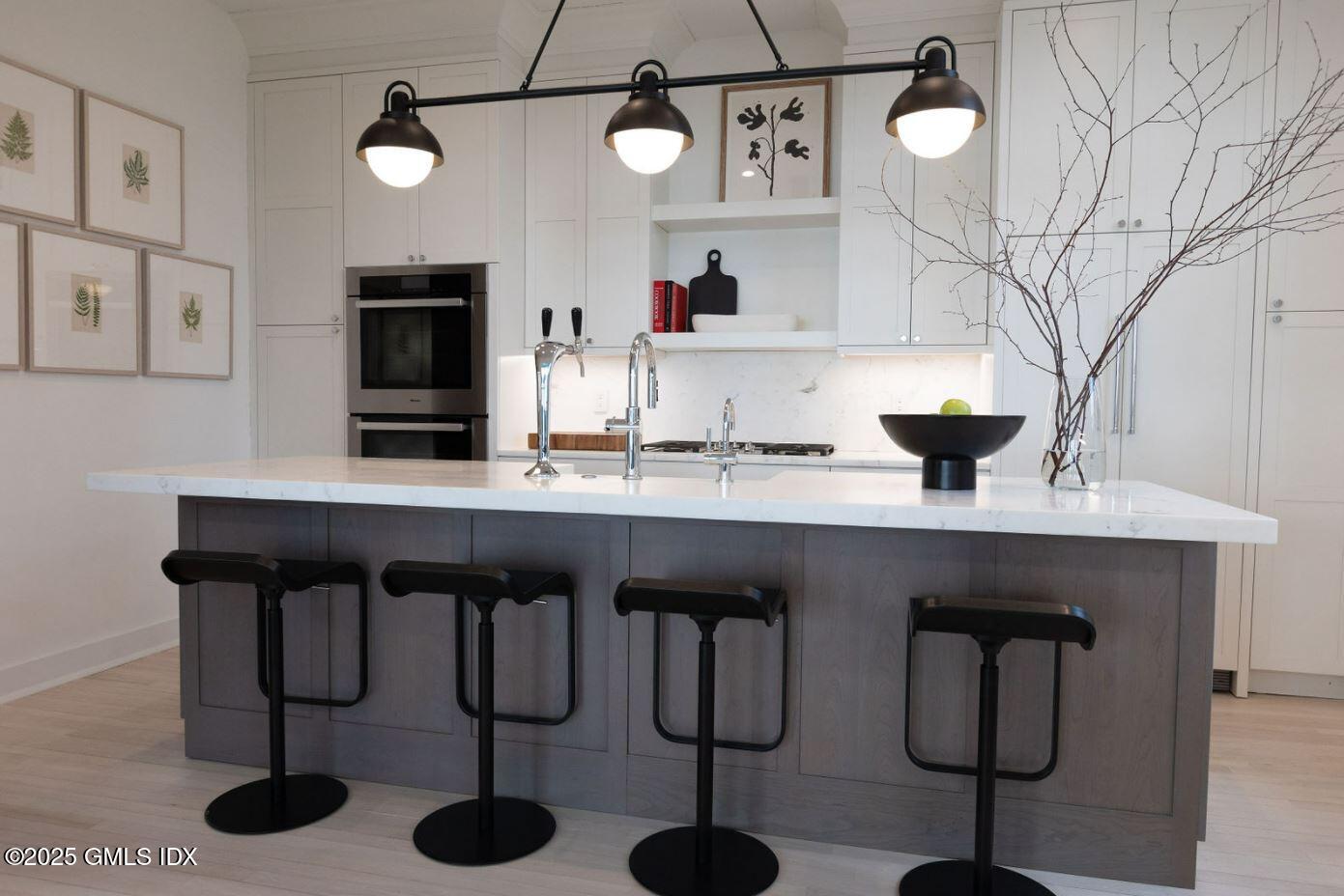 19 Weeds Landing Darien, CT 06820 - Photo 90 of 98 a kitchen with a sink cabinets and appliances