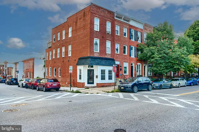 a cars parked in front of a building