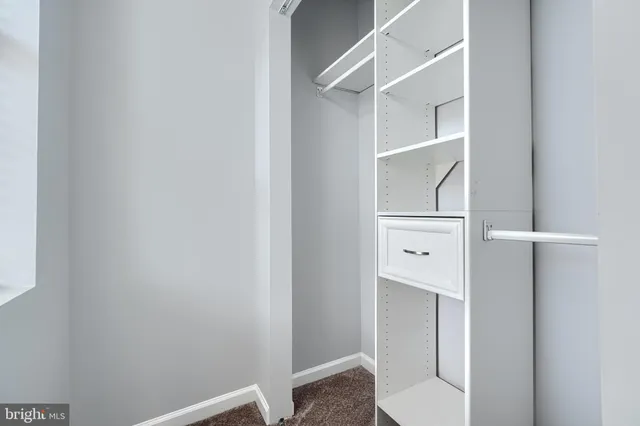 a bathroom with a toilet and a sink