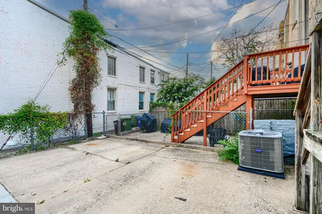 a view of a street with cars on the road
