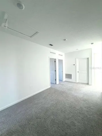 a bathroom with a toilet and a bathtub