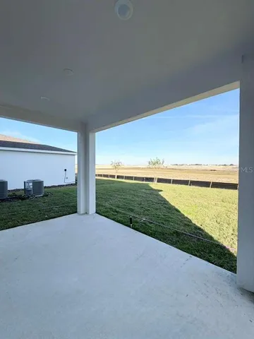 a view of an outdoor space and a yard