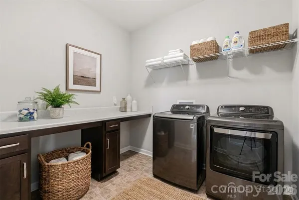 a kitchen with a stove and cabinets