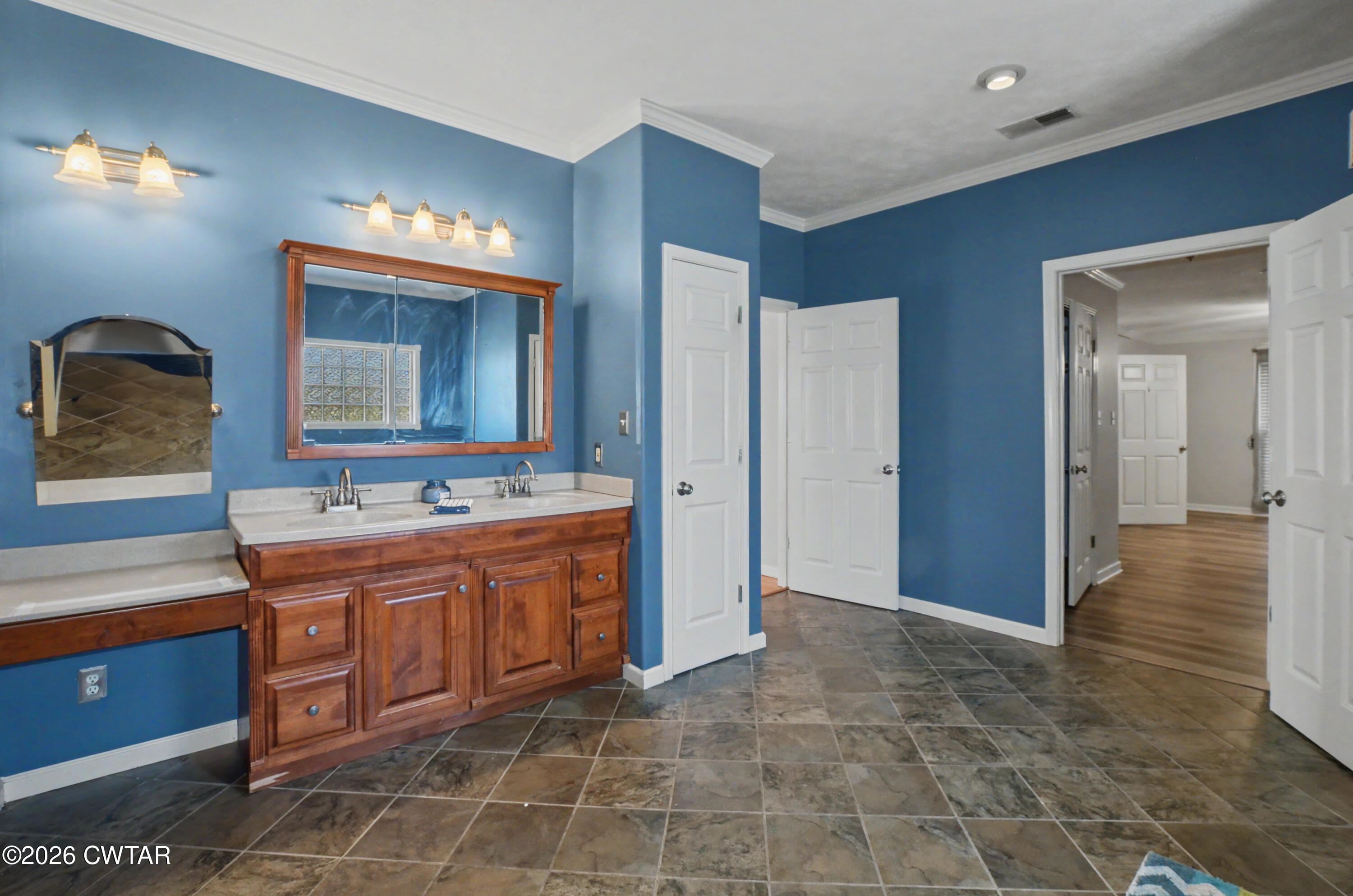 593 Sunny Hill Road Alamo, TN 38001 - Photo 23 of 29 a spacious bathroom with a mirror sink and bathtub