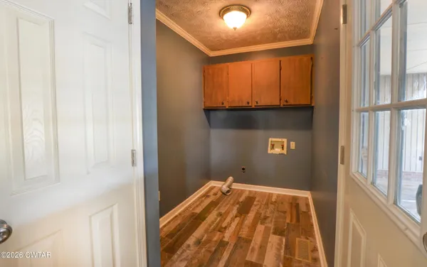 a view of a bedroom from a hallway