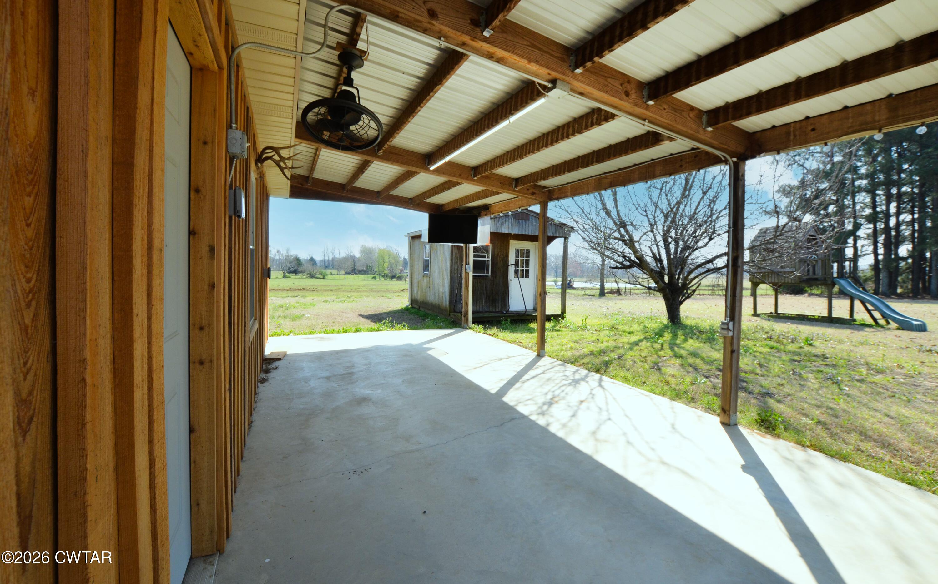 593 Sunny Hill Road Alamo, TN 38001 - Photo 8 of 29 a view of swimming pool with a patio