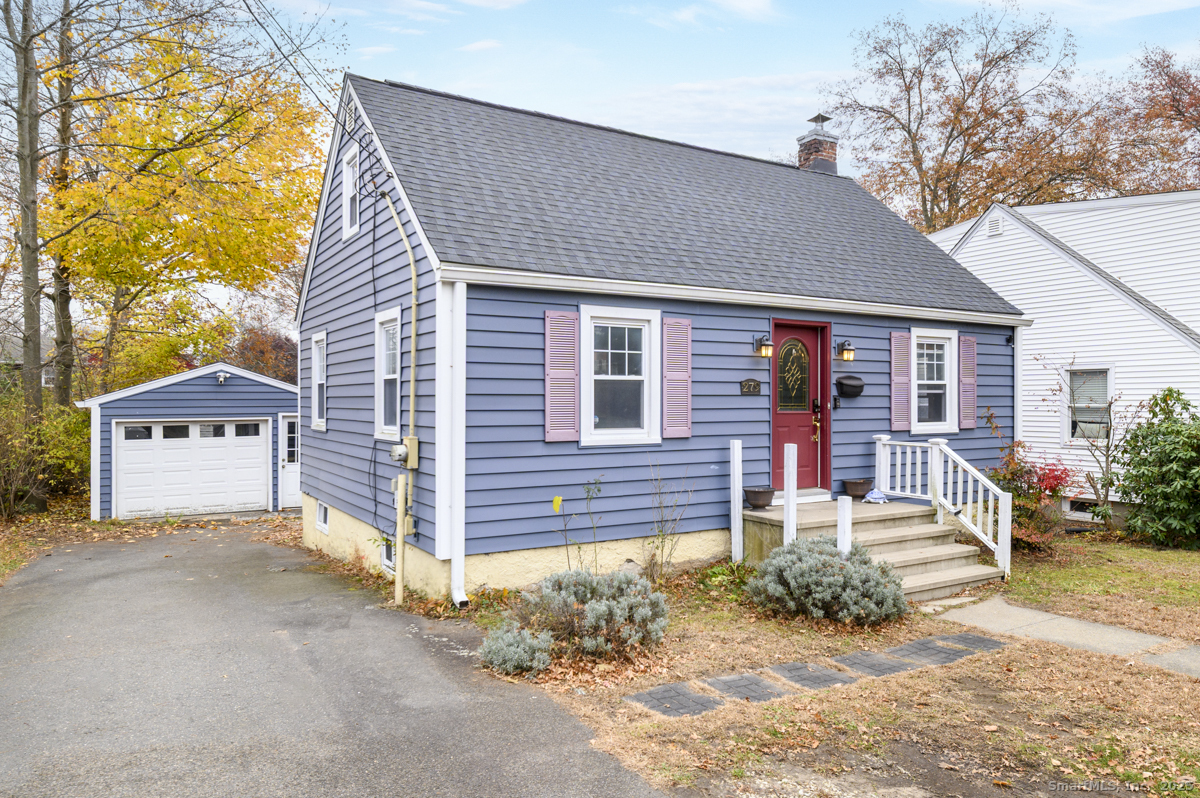 279 Knapps Highway Fairfield, CT 06825 - Photo 23 of 24 a front view of a house with a garage