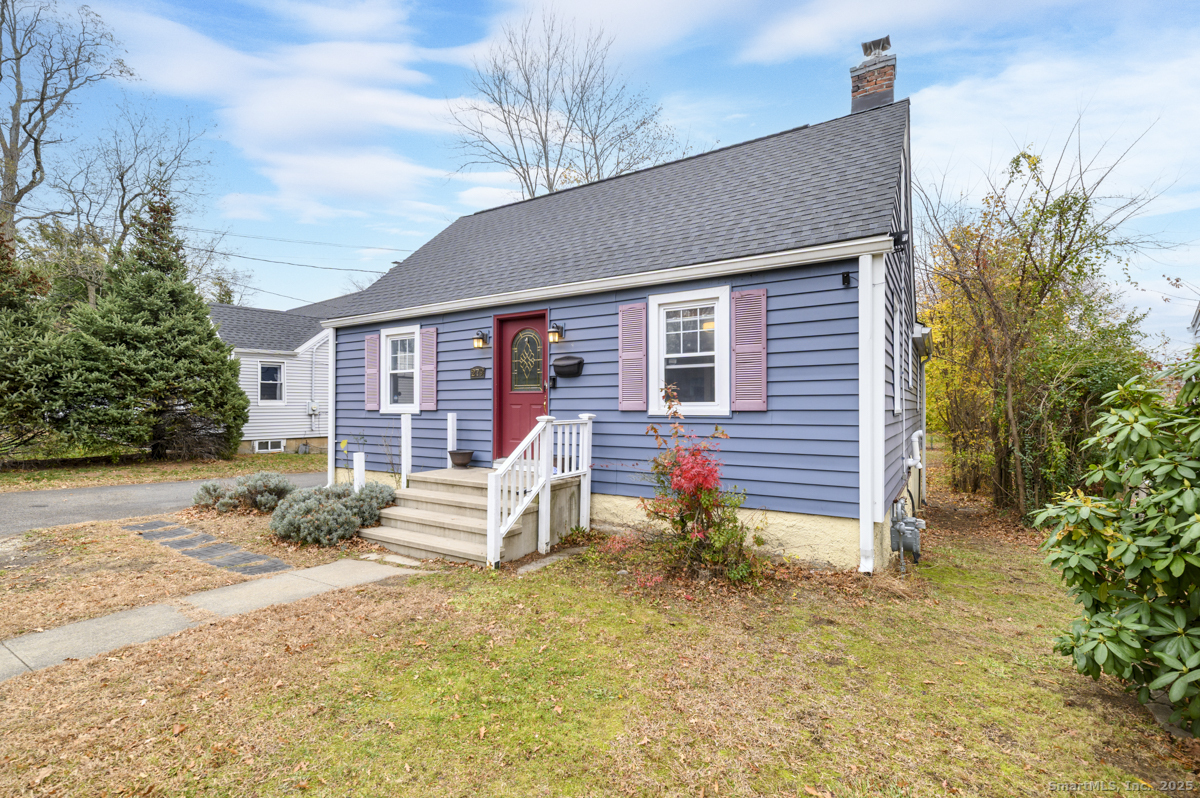 279 Knapps Highway Fairfield, CT 06825 - Photo 24 of 24 a view of a house with a yard and garage