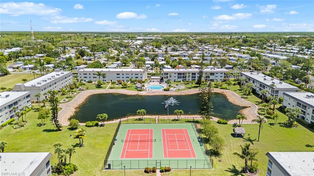 1004 Manatee Road, Unit H306 Naples, FL 34114 - Photo 34 of 48 an aerial view of a houses with a lake view