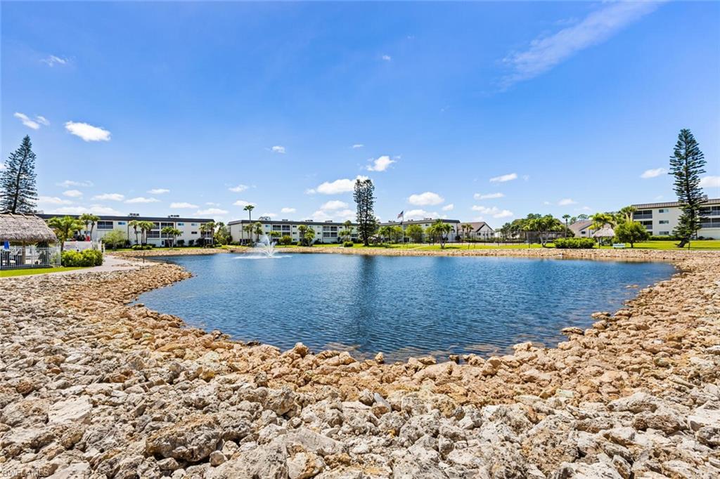 1004 Manatee Road, Unit H306 Naples, FL 34114 - Photo 48 of 48 a view of a lake with a city view