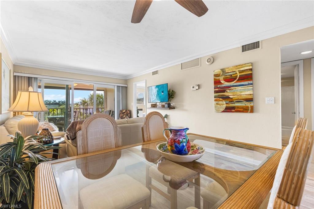 1004 Manatee Road, Unit H306 Naples, FL 34114 - Photo 8 of 48 a view of a dining room with furniture window and outside view