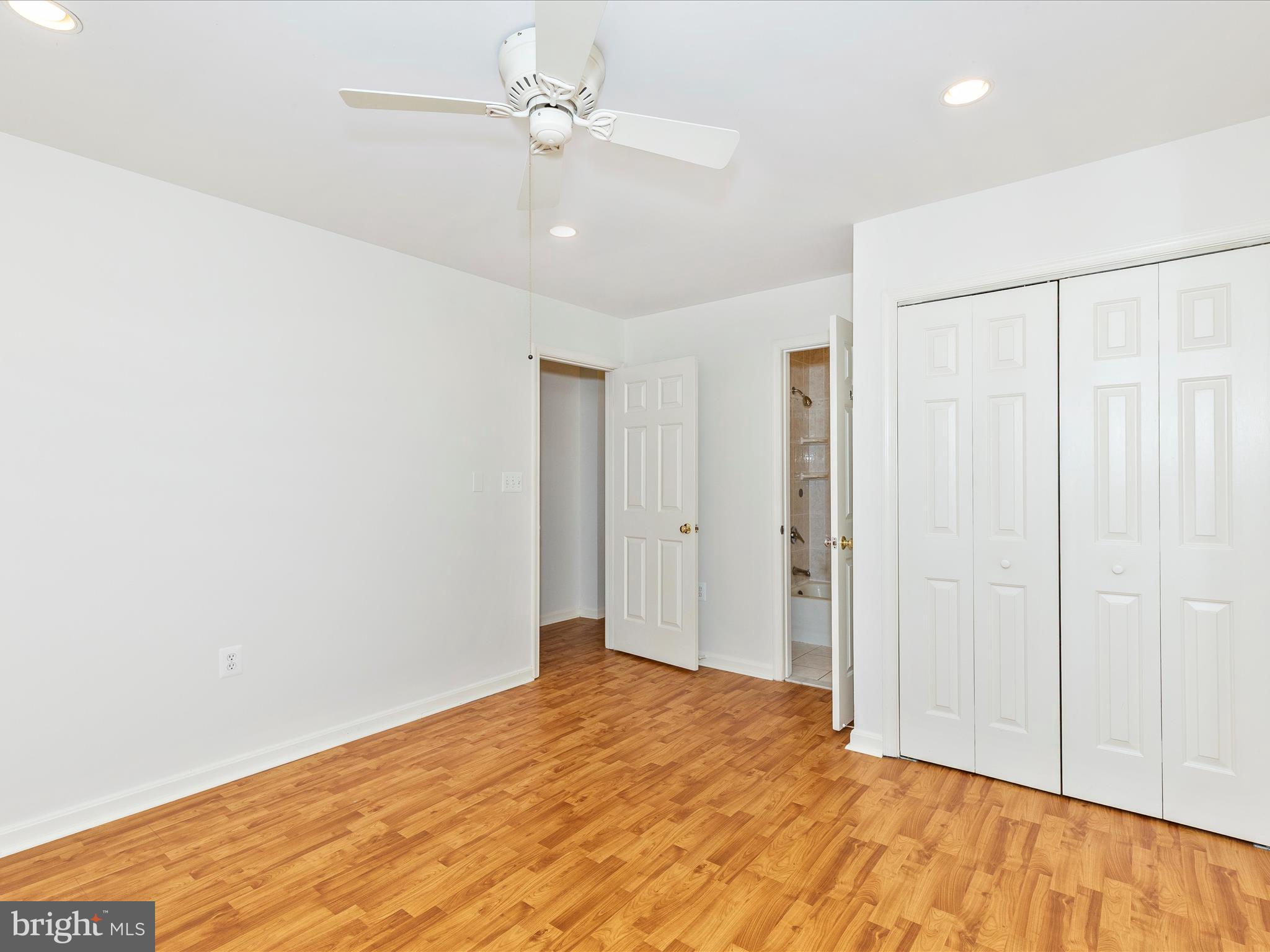 402 Windy Knoll Drive Mount Airy, MD 21771 - Photo 20 of 51 a view of empty room with wooden floor