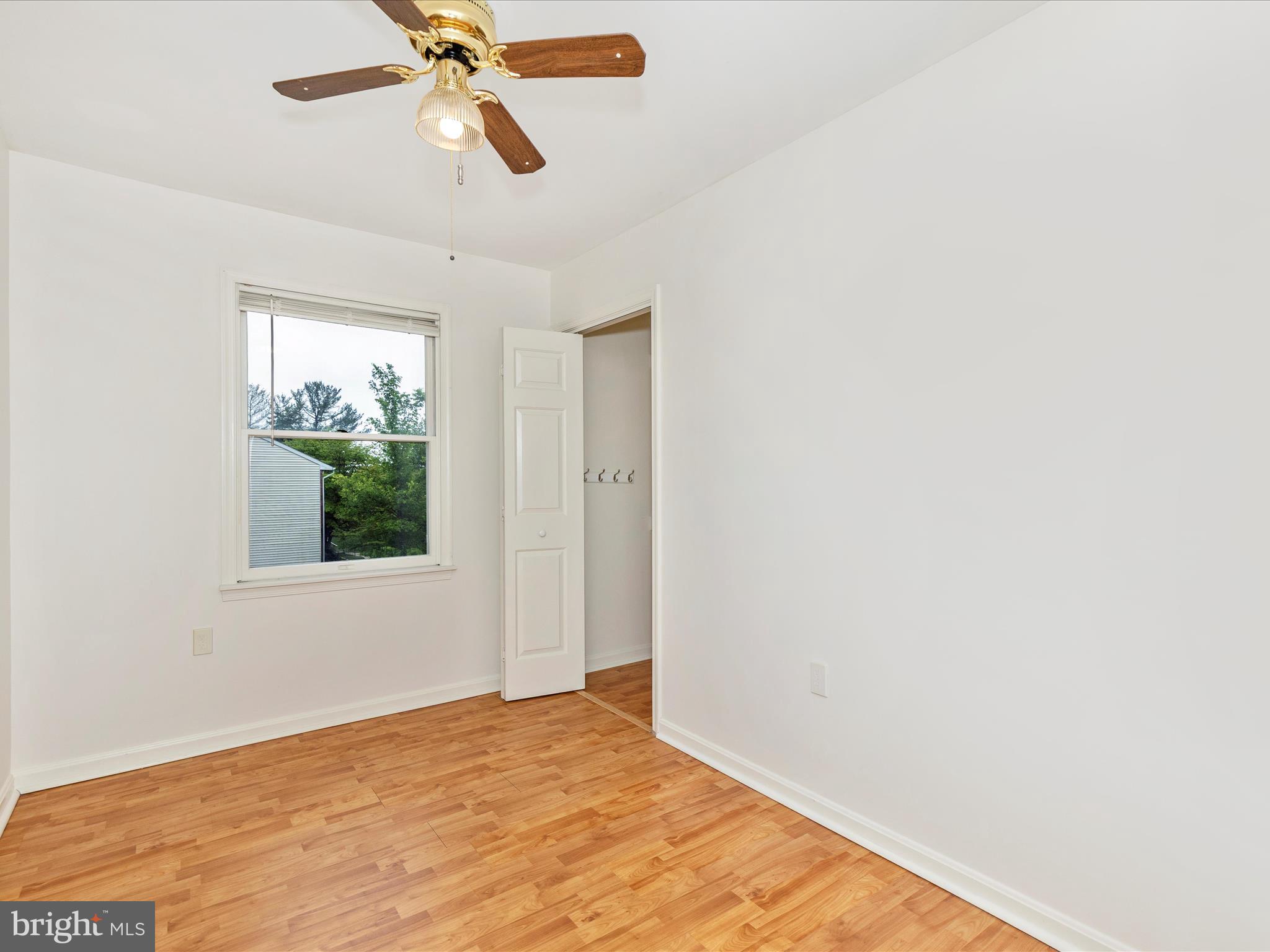402 Windy Knoll Drive Mount Airy, MD 21771 - Photo 22 of 51 a view of an empty room with a window