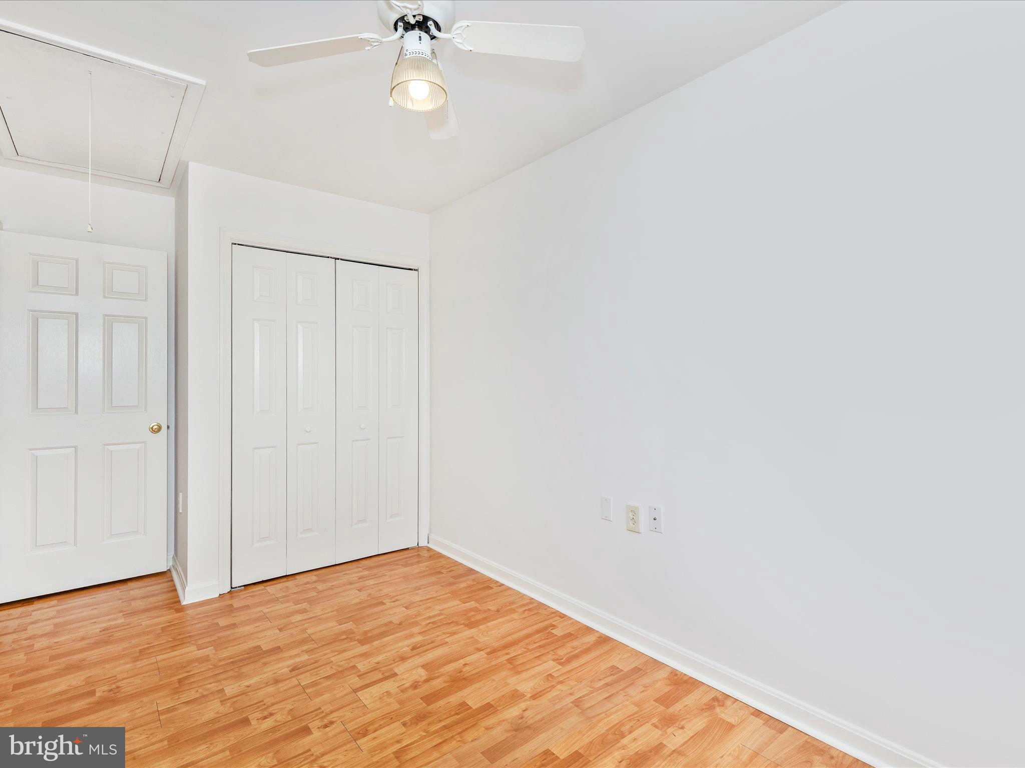 402 Windy Knoll Drive Mount Airy, MD 21771 - Photo 29 of 51 a view of empty room with wooden floor