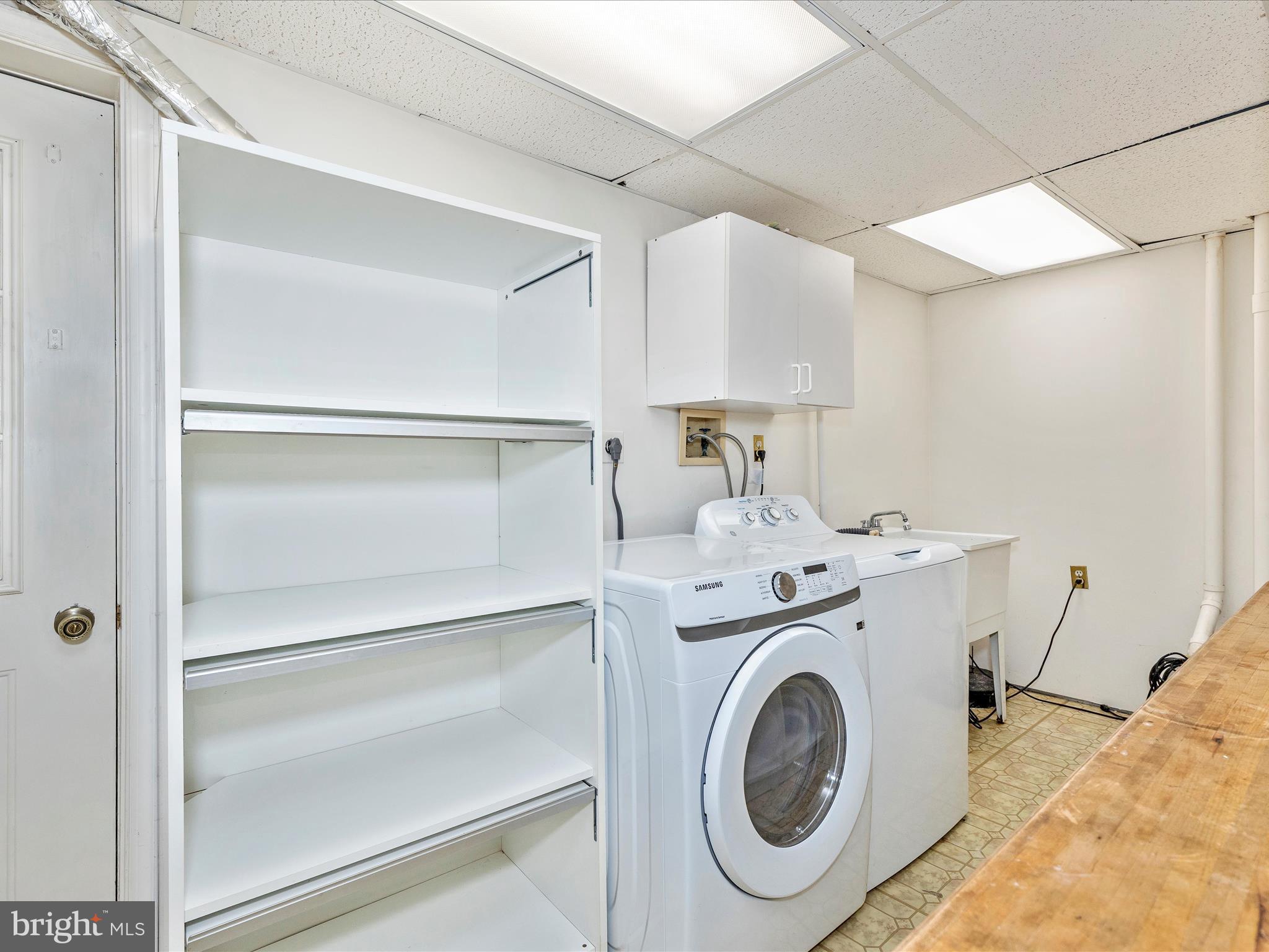 402 Windy Knoll Drive Mount Airy, MD 21771 - Photo 37 of 51 a utility room with sink dryer and washer