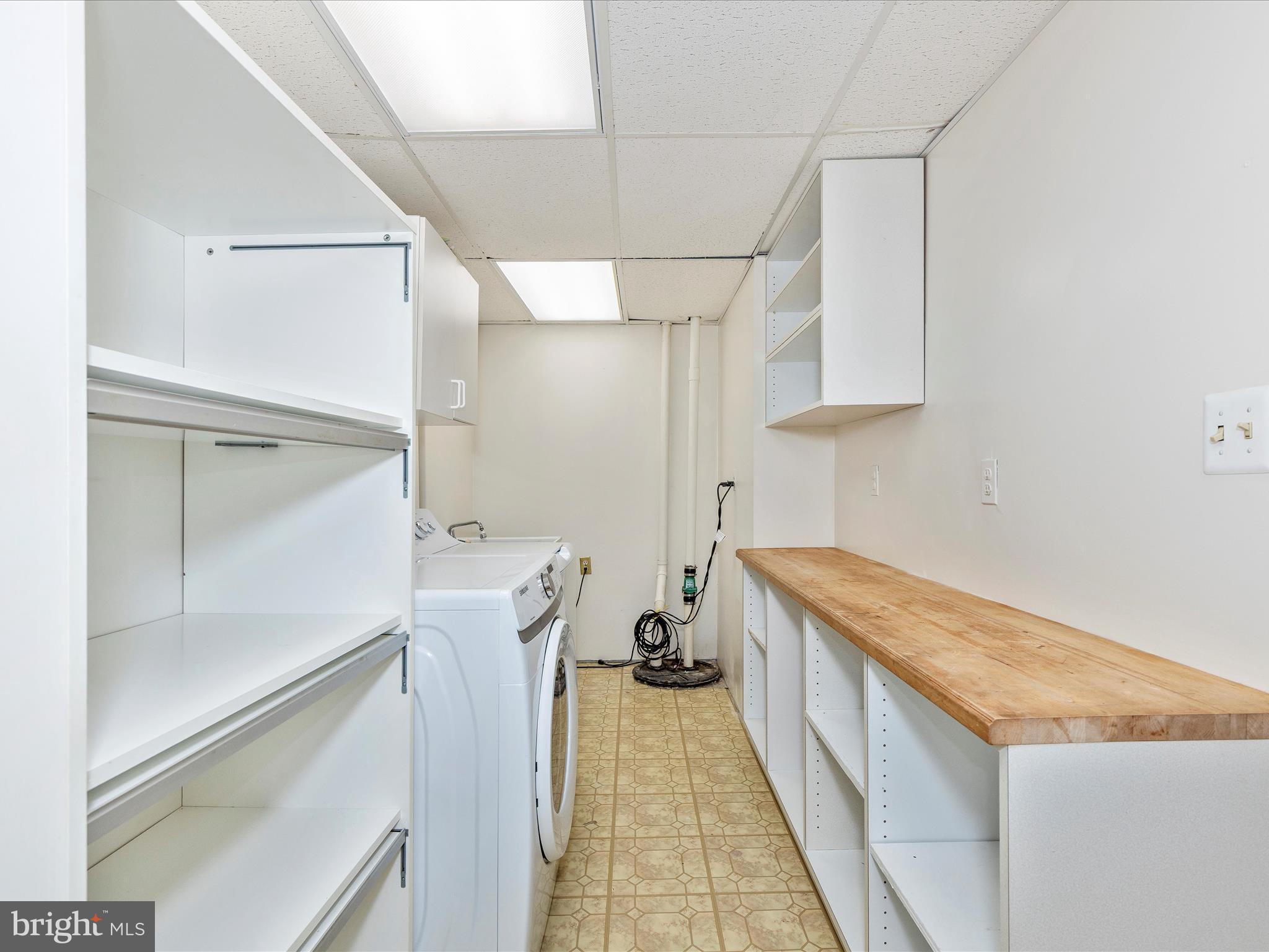 402 Windy Knoll Drive Mount Airy, MD 21771 - Photo 38 of 51 a bathroom with a granite countertop sink a toilet and bathtub
