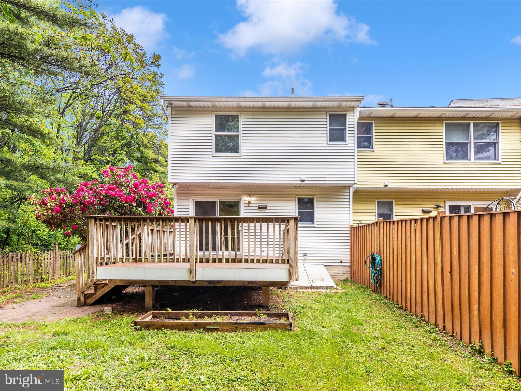 402 Windy Knoll Drive Mount Airy, MD 21771 - Photo 45 of 51 a view of a house with wooden deck and furniture