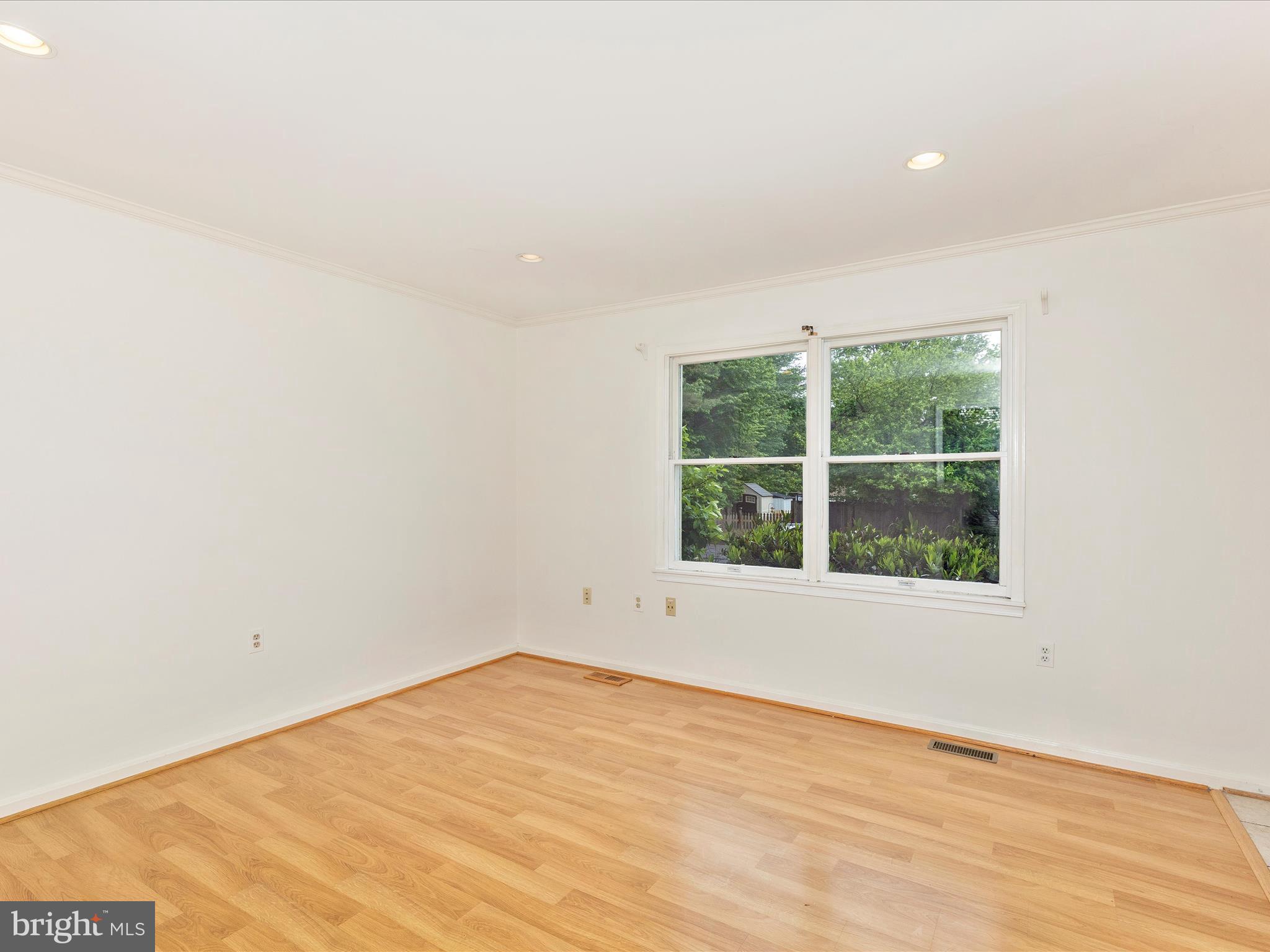 402 Windy Knoll Drive Mount Airy, MD 21771 - Photo 8 of 51 an empty room with a window