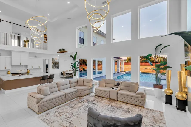 a living room with furniture and a rug