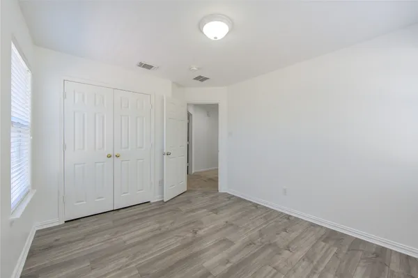 a view of a porch and garden
