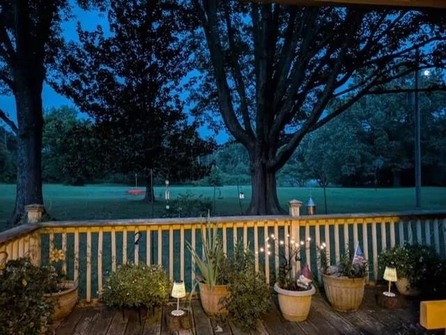 a bathroom with a double vanity sink and mirror