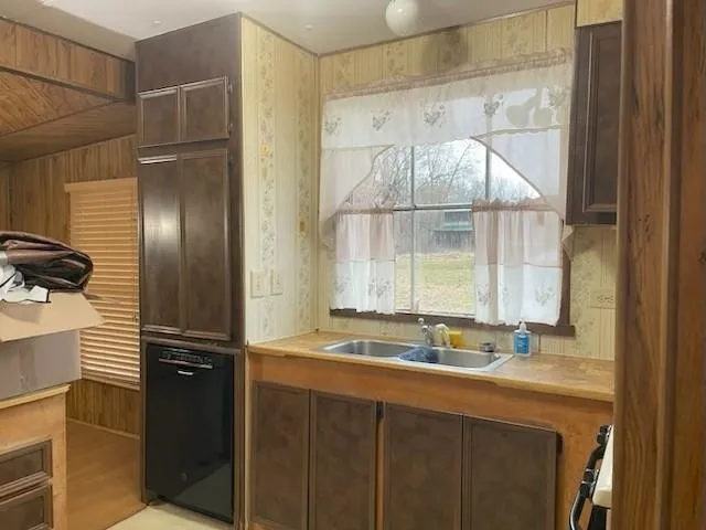 a view of a room with a wooden door