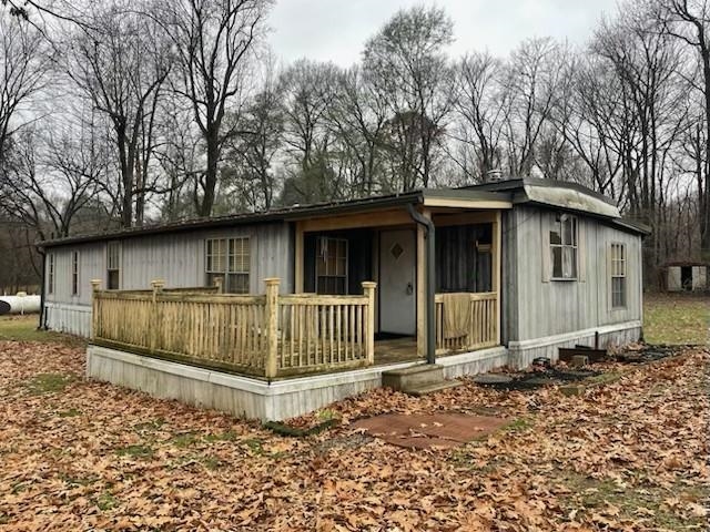5885 Ramsey Road Millington, TN 38053 - Photo 9 of 11 a front view of a house with a garden
