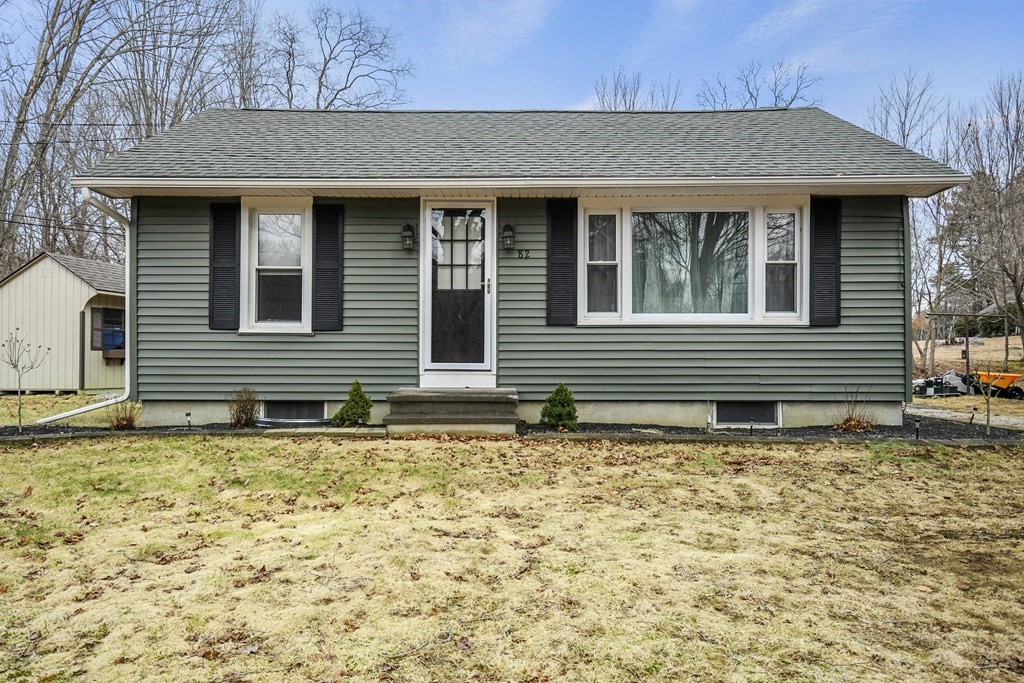 a house with trees in front of it